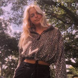 urban outfitters fuzzy cheetah pullover sweater M